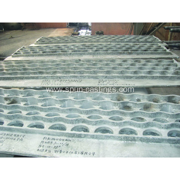 Cast tube sheet for convection section